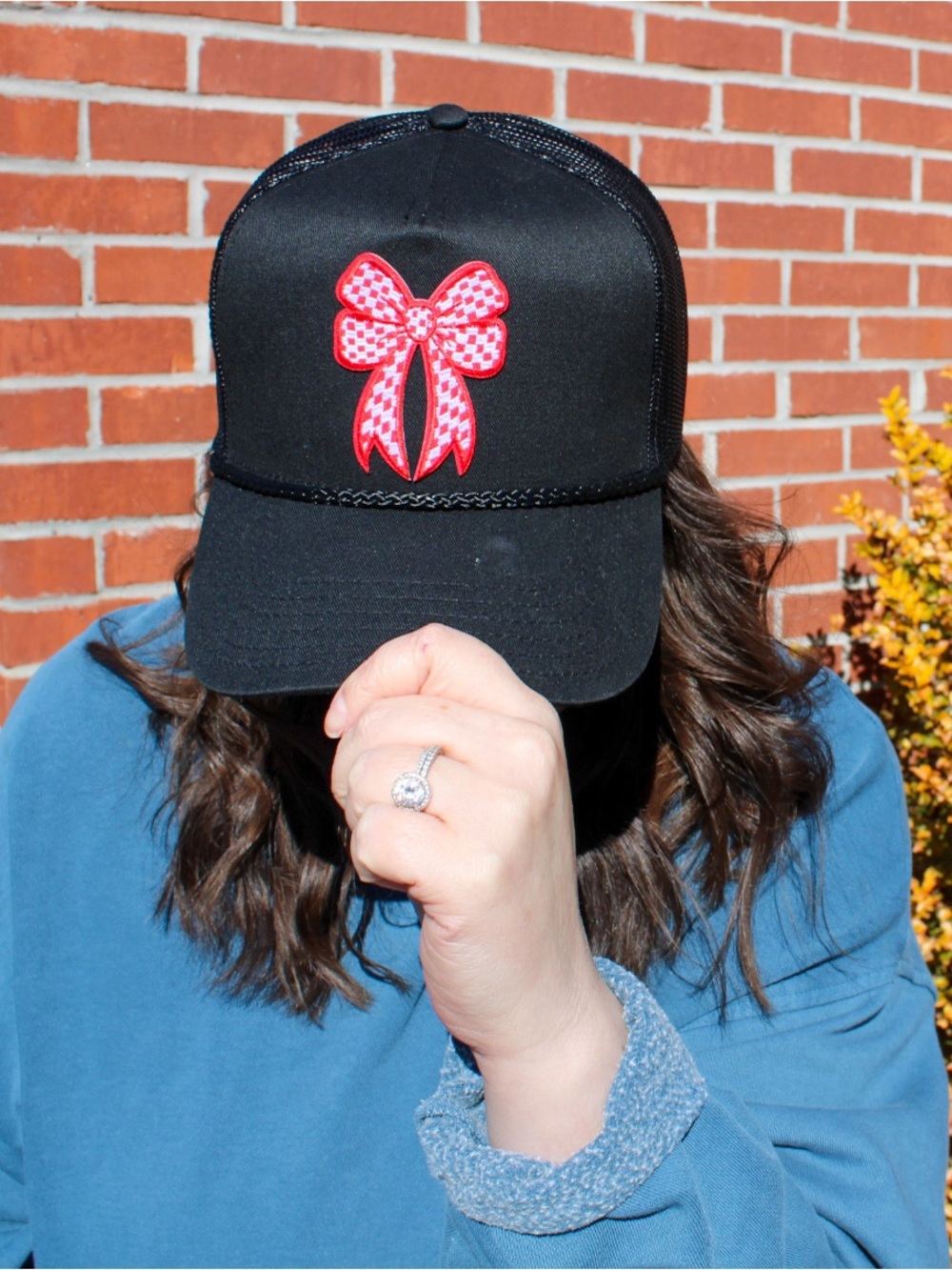 Otto Black Trucker Hat with Red Bow Patch